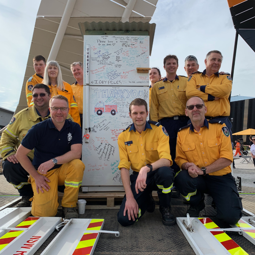 The brigade at the donation of the Black Summer Bungendore Fridge